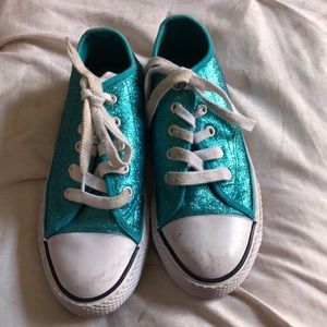 Blue sparkly Jojo shoes they are sneakers.